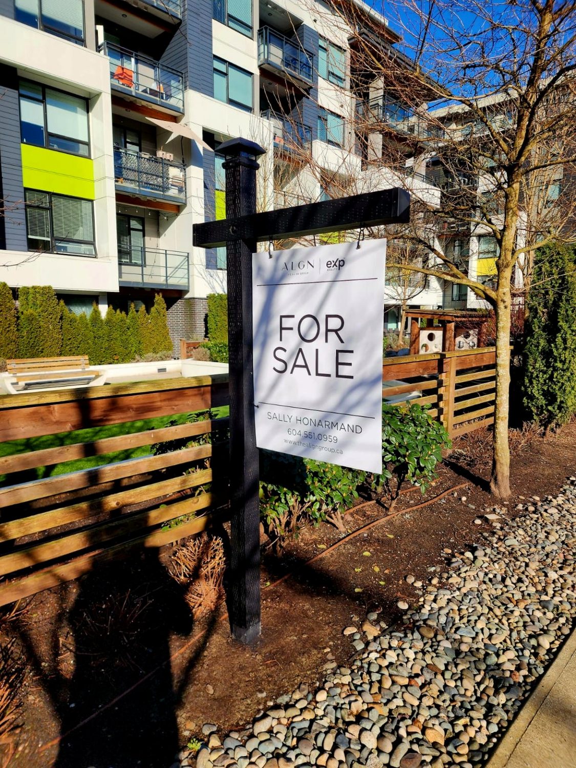Black eXp real estate sign post